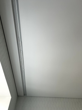 Безщілинні натяжні стелі